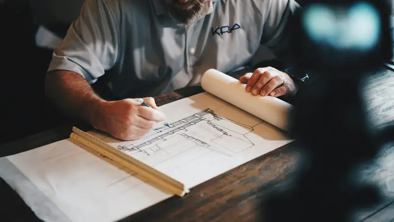 Illustration : étude de plans d'un projet d'extension